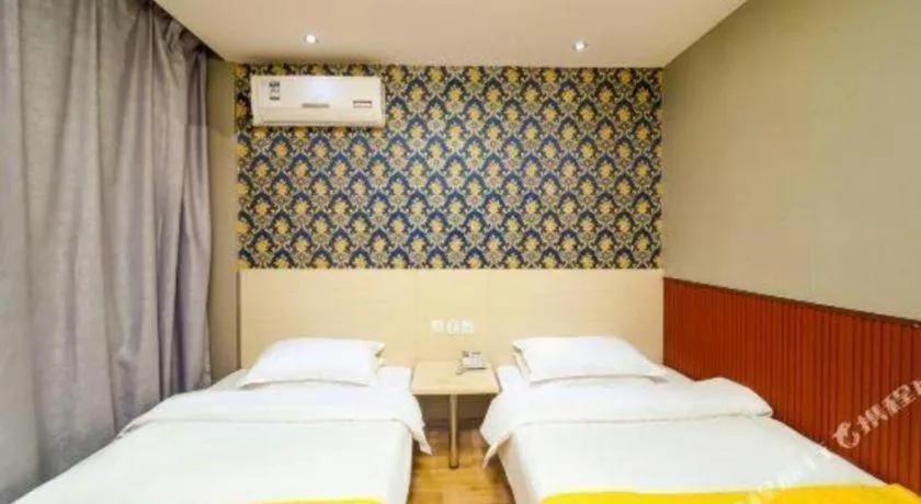 Bed in Kunlun Leju Business Hotel Kaifeng Gulou