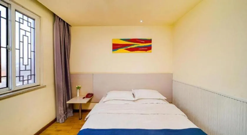 Bed in Kunlun Leju Business Hotel Kaifeng Gulou