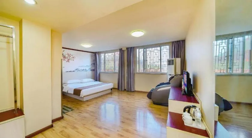 Bed in Kunlun Leju Business Hotel Kaifeng Gulou