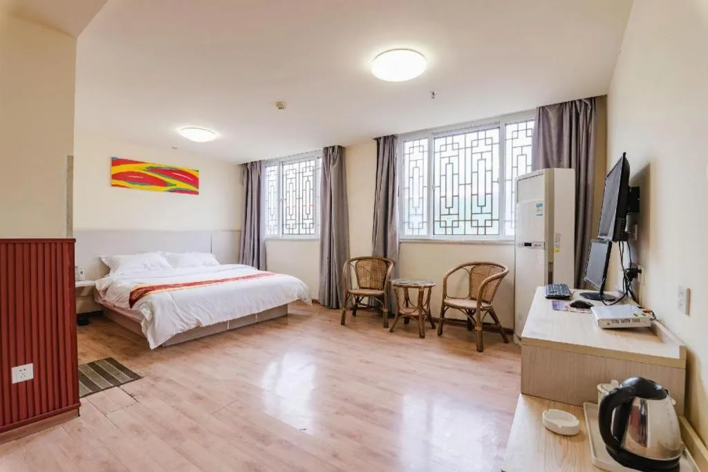 Bed in Kunlun Leju Business Hotel Kaifeng Gulou