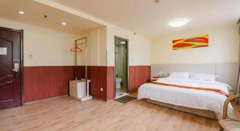 Bed in Kunlun Leju Business Hotel Kaifeng Gulou