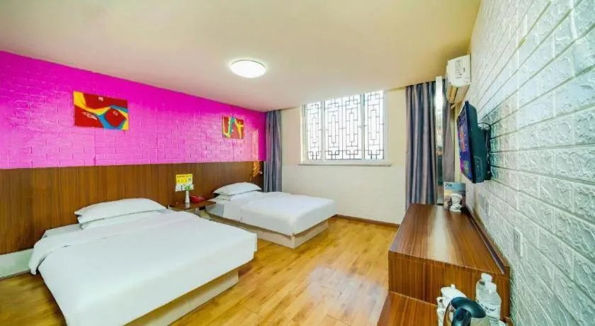Bed in Kunlun Leju Business Hotel Kaifeng Gulou