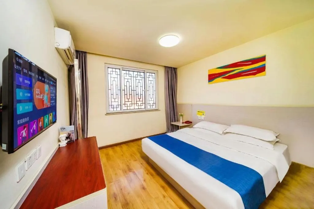 Bed in Kunlun Leju Business Hotel Kaifeng Gulou