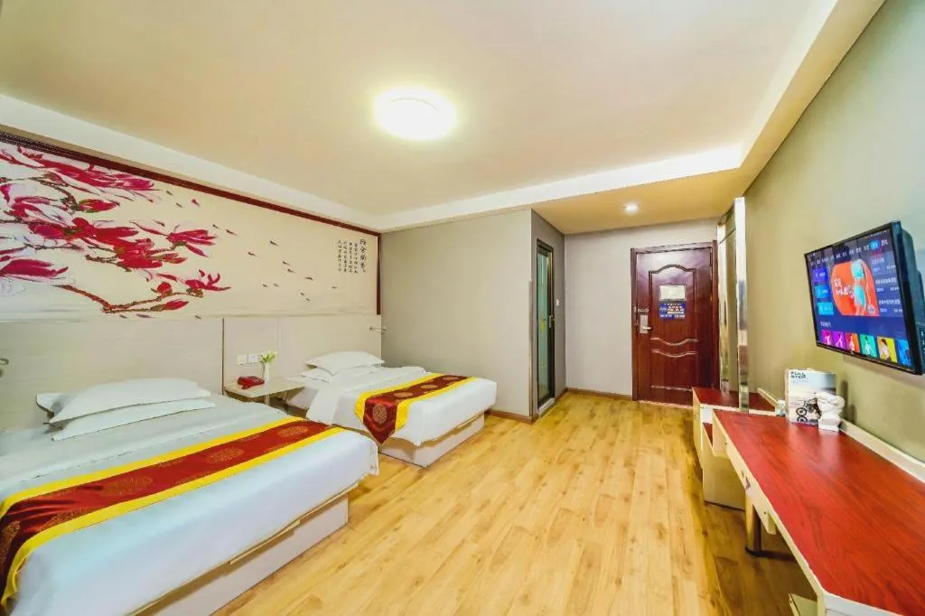 Bed in Kunlun Leju Business Hotel Kaifeng Gulou