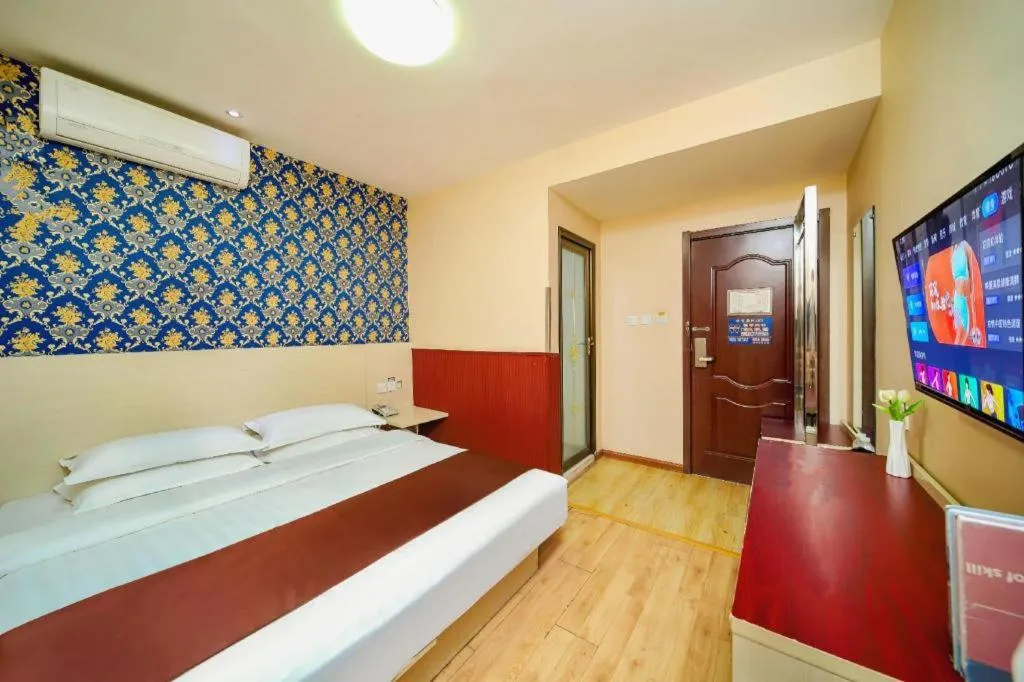 Bed in Kunlun Leju Business Hotel Kaifeng Gulou