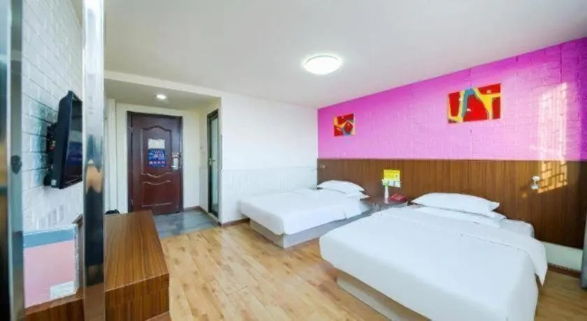 Bed in Kunlun Leju Business Hotel Kaifeng Gulou