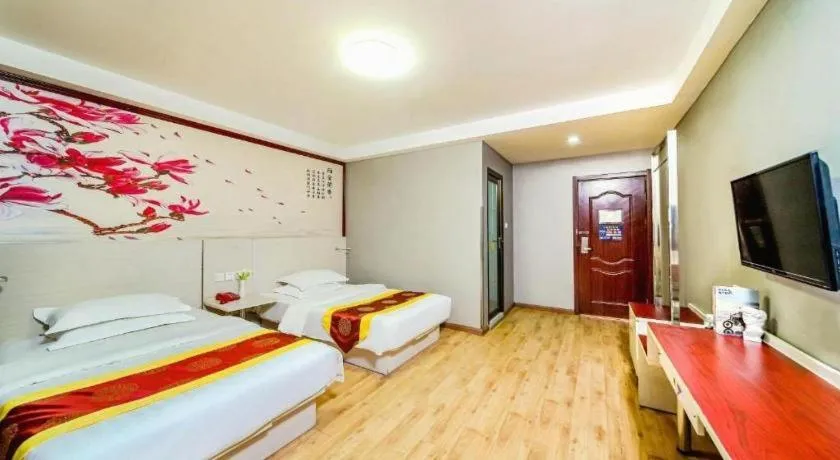 Bed in Kunlun Leju Business Hotel Kaifeng Gulou