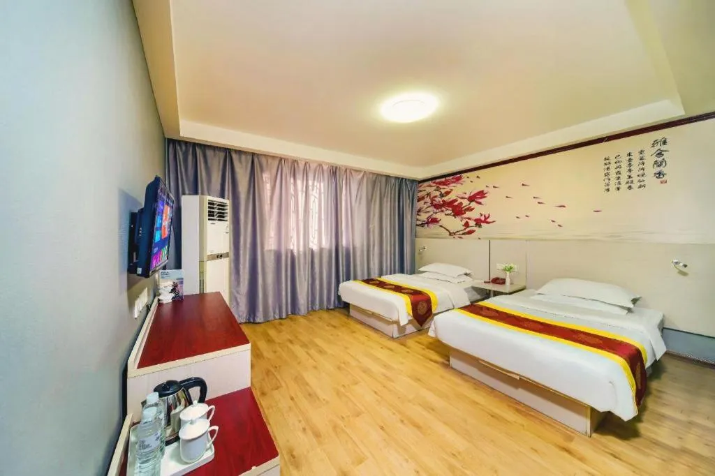 Bed in Kunlun Leju Business Hotel Kaifeng Gulou