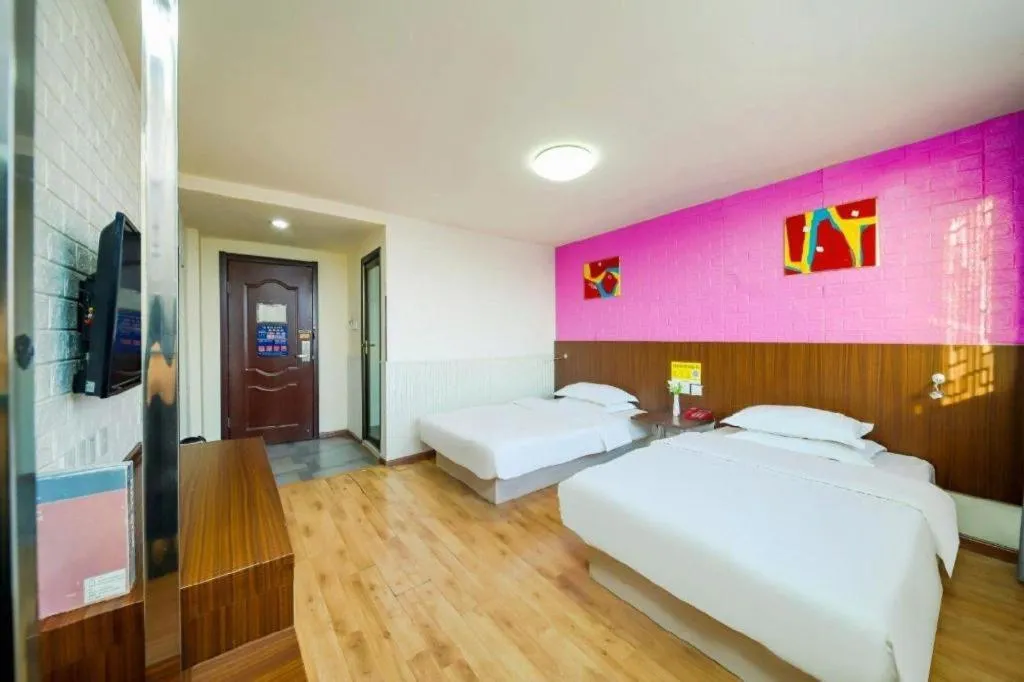 Bed in Kunlun Leju Business Hotel Kaifeng Gulou