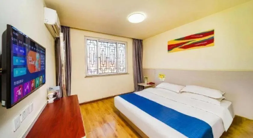 Bed in Kunlun Leju Business Hotel Kaifeng Gulou