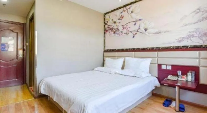 Bed in Kunlun Leju Business Hotel Kaifeng Gulou