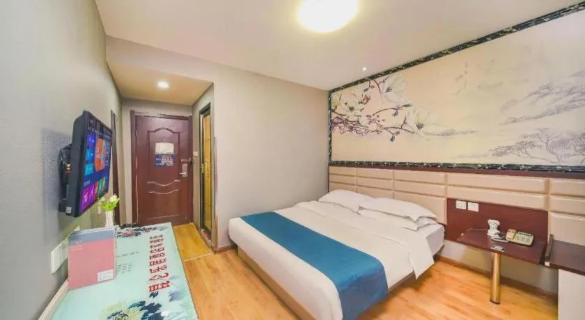 Bed in Kunlun Leju Business Hotel Kaifeng Gulou