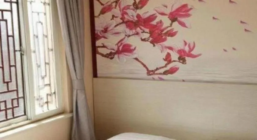 Bed in Kunlun Leju Business Hotel Kaifeng Gulou