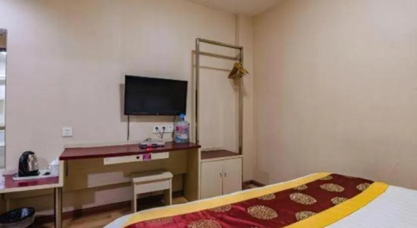 Bed in Kunlun Leju Business Hotel Kaifeng Gulou