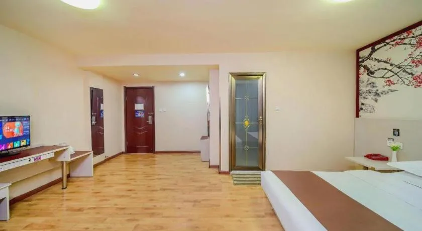 Bed in Kunlun Leju Business Hotel Kaifeng Gulou