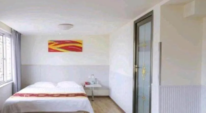 Bed in Kunlun Leju Business Hotel Kaifeng Gulou