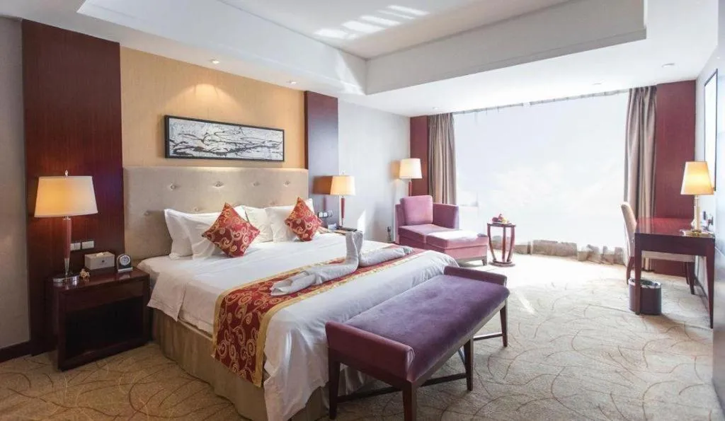 Bed in Wuhan Soluxe Hotel