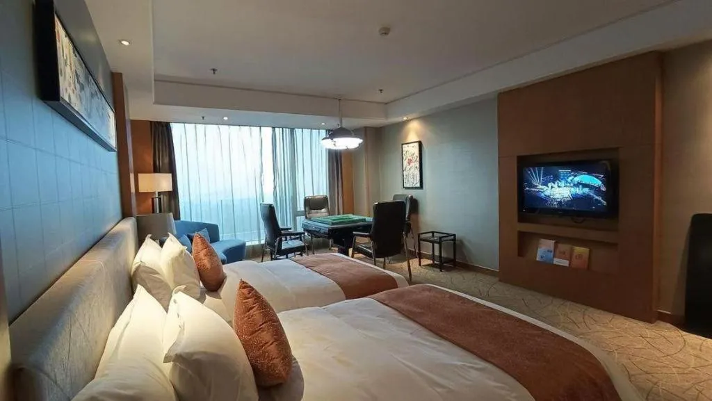 Bed in Wuhan Soluxe Hotel