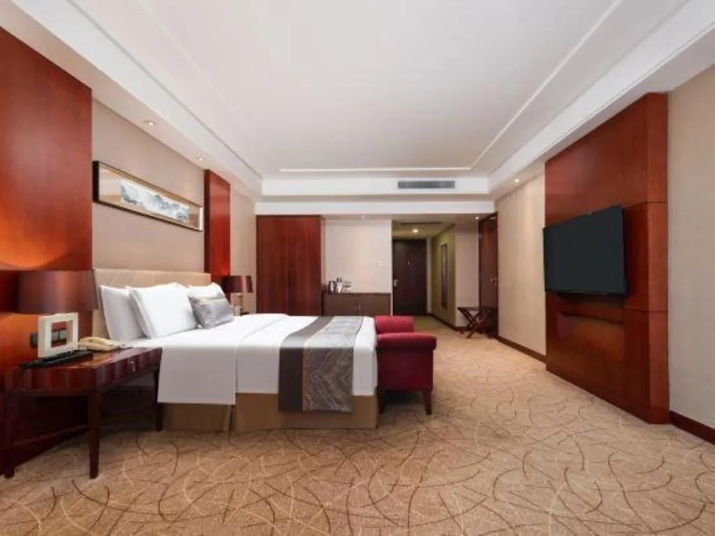 Bed in Wuhan Soluxe Hotel