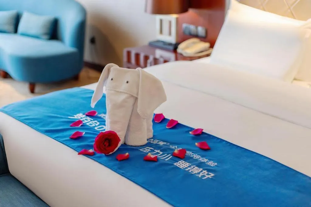 Bed in Wuhan Soluxe Hotel