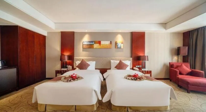 Bed in Wuhan Soluxe Hotel