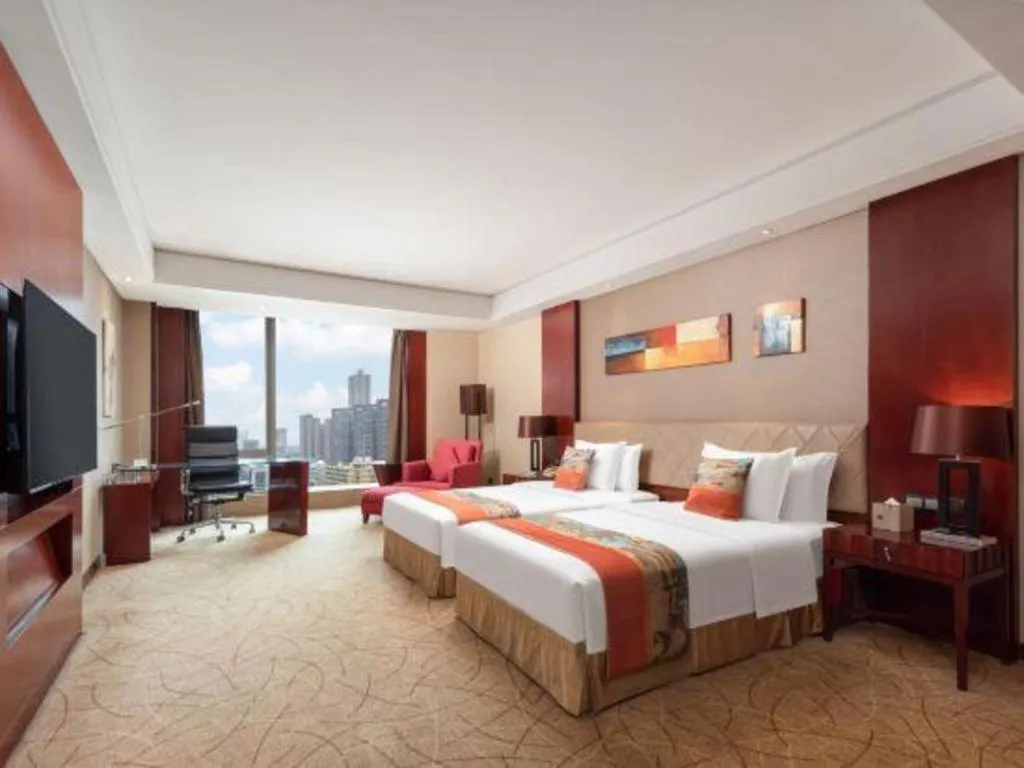 Bed in Wuhan Soluxe Hotel