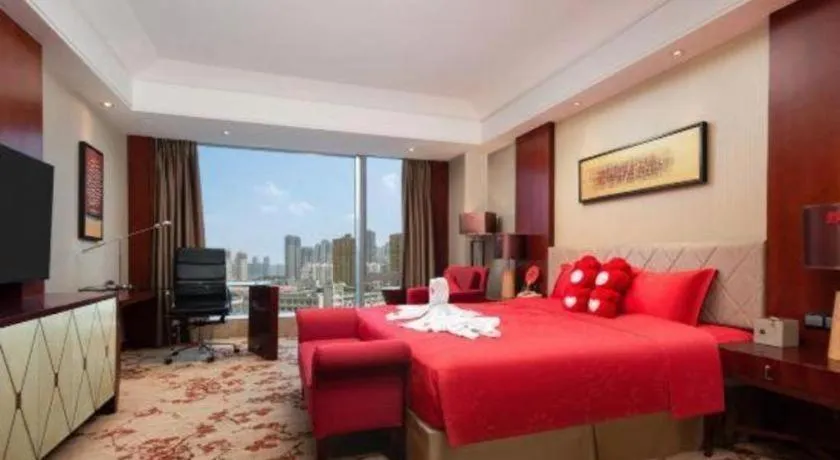 Bed in Wuhan Soluxe Hotel