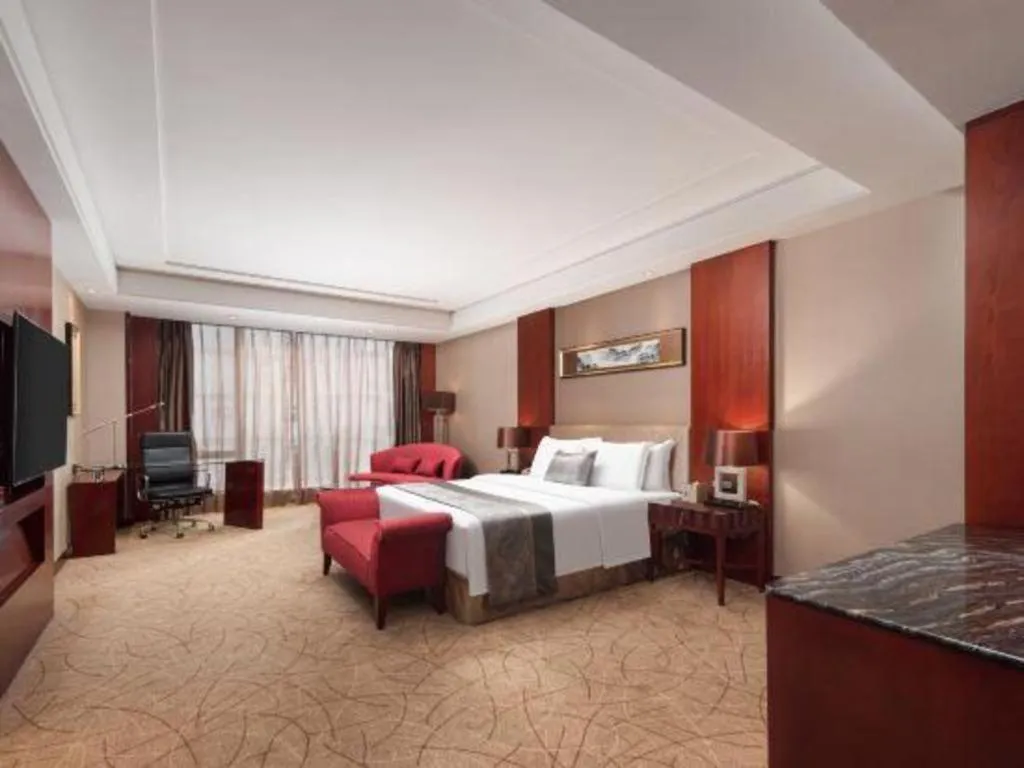 Bed in Wuhan Soluxe Hotel