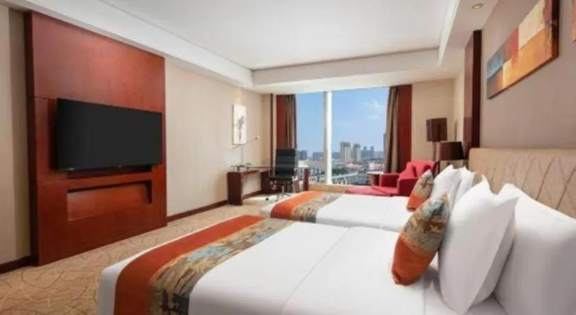 Bed in Wuhan Soluxe Hotel