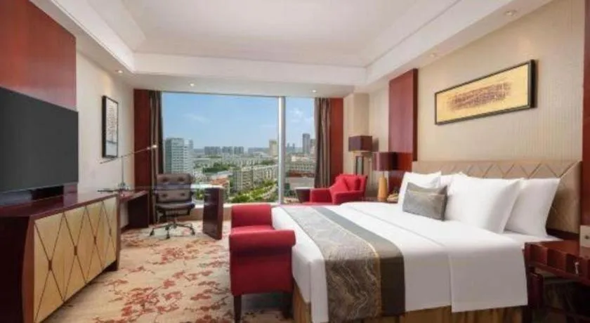 Bed in Wuhan Soluxe Hotel