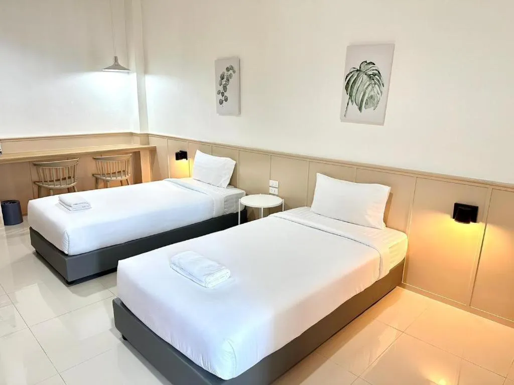 Bed in Grand PL Ville Hotel