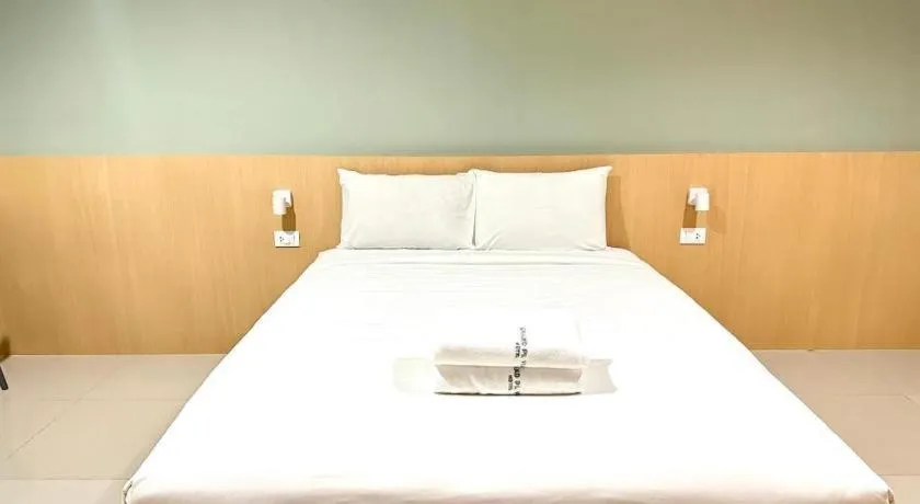 Bed in Grand PL Ville Hotel