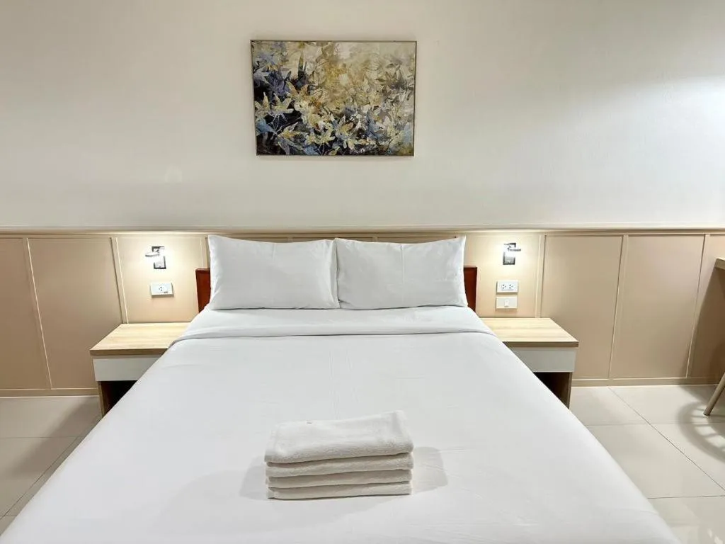 Bed in Grand PL Ville Hotel