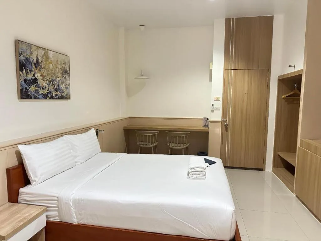 Bed in Grand PL Ville Hotel