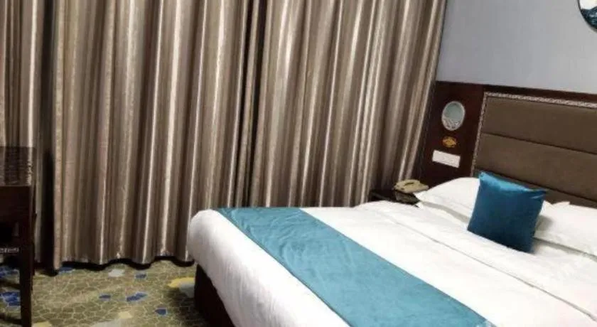 Bed in Dunhuang Dunhe Hotel