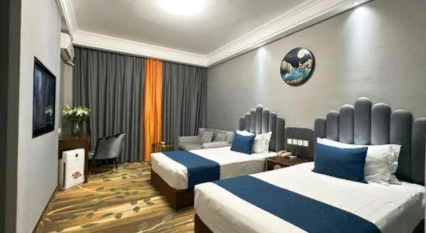 Bed in Dunhuang Dunhe Hotel