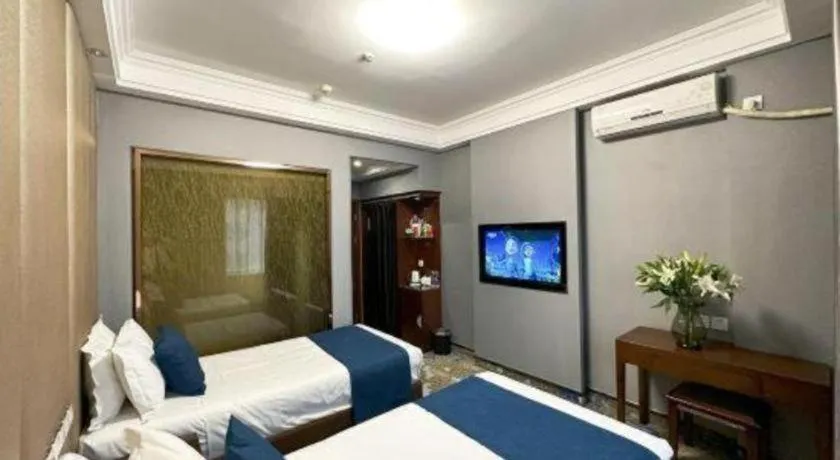 Bed in Dunhuang Dunhe Hotel