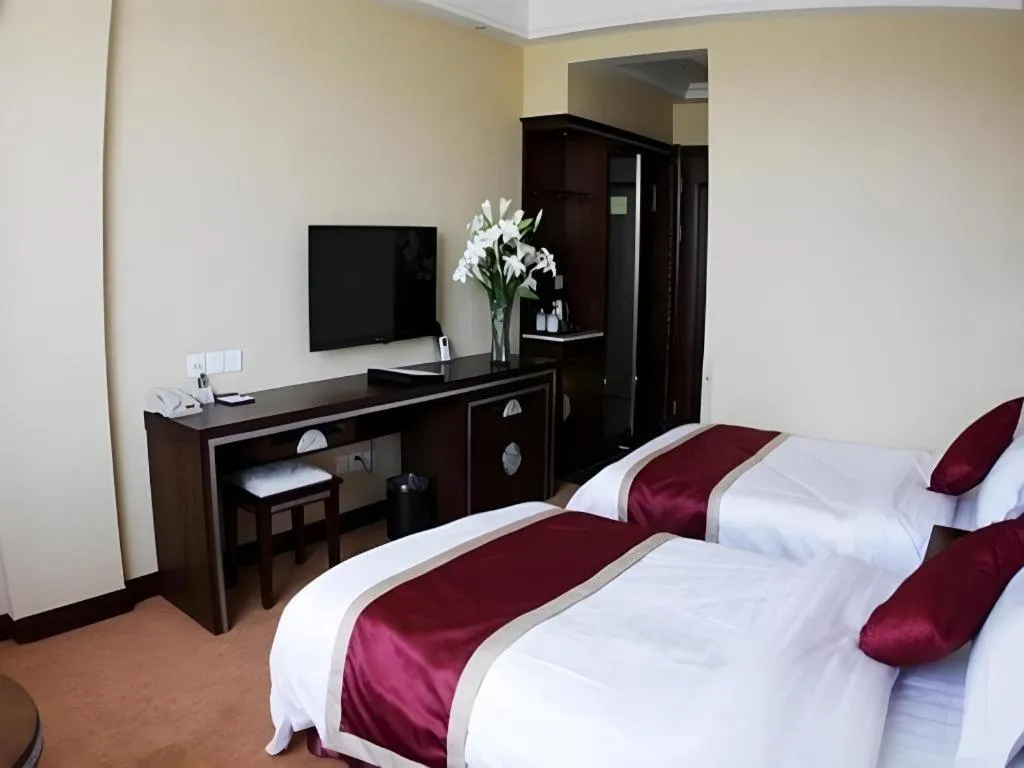 Bed in Dunhuang Dunhe Hotel