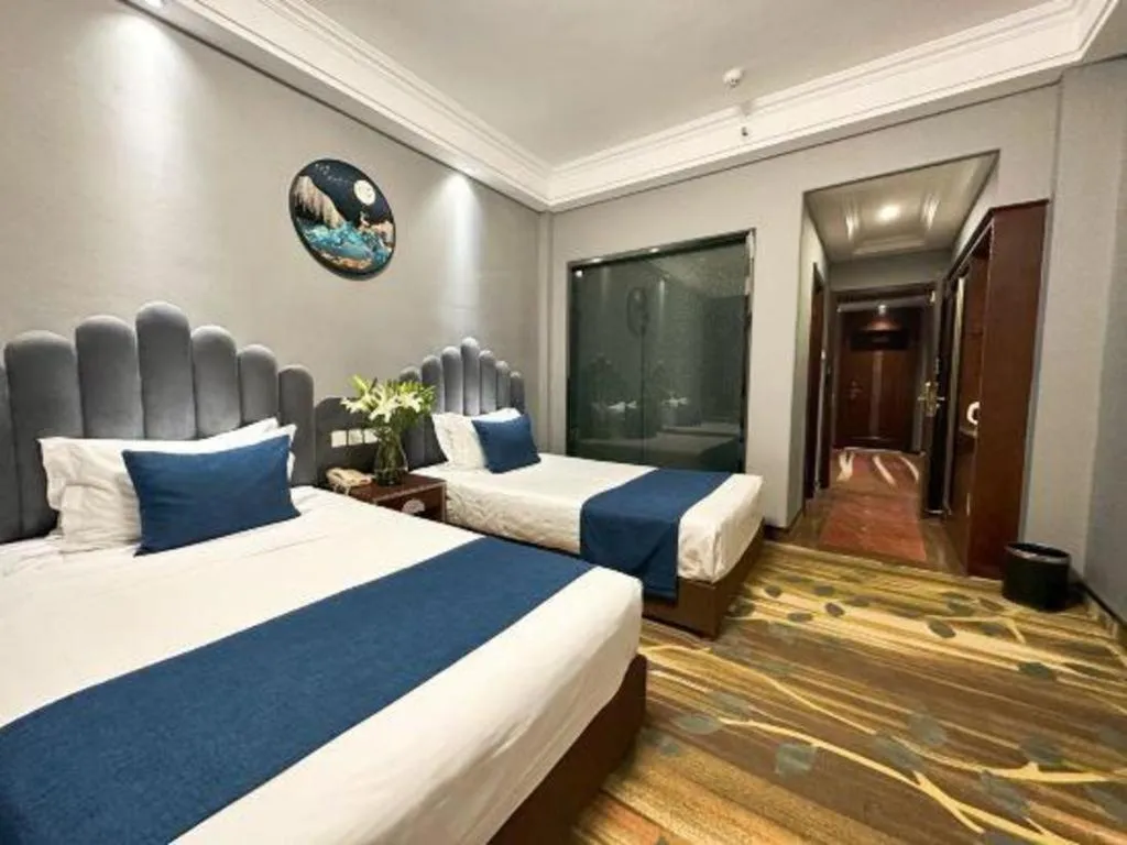 Bed in Dunhuang Dunhe Hotel