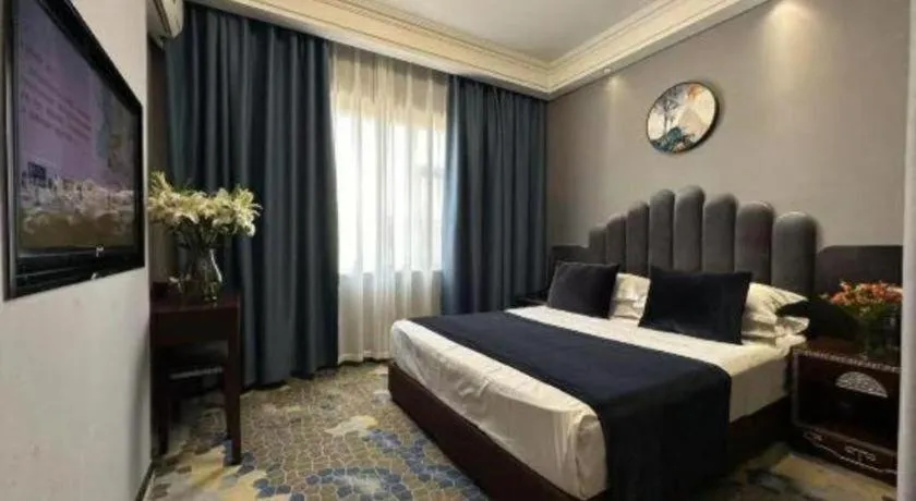 Bed in Dunhuang Dunhe Hotel