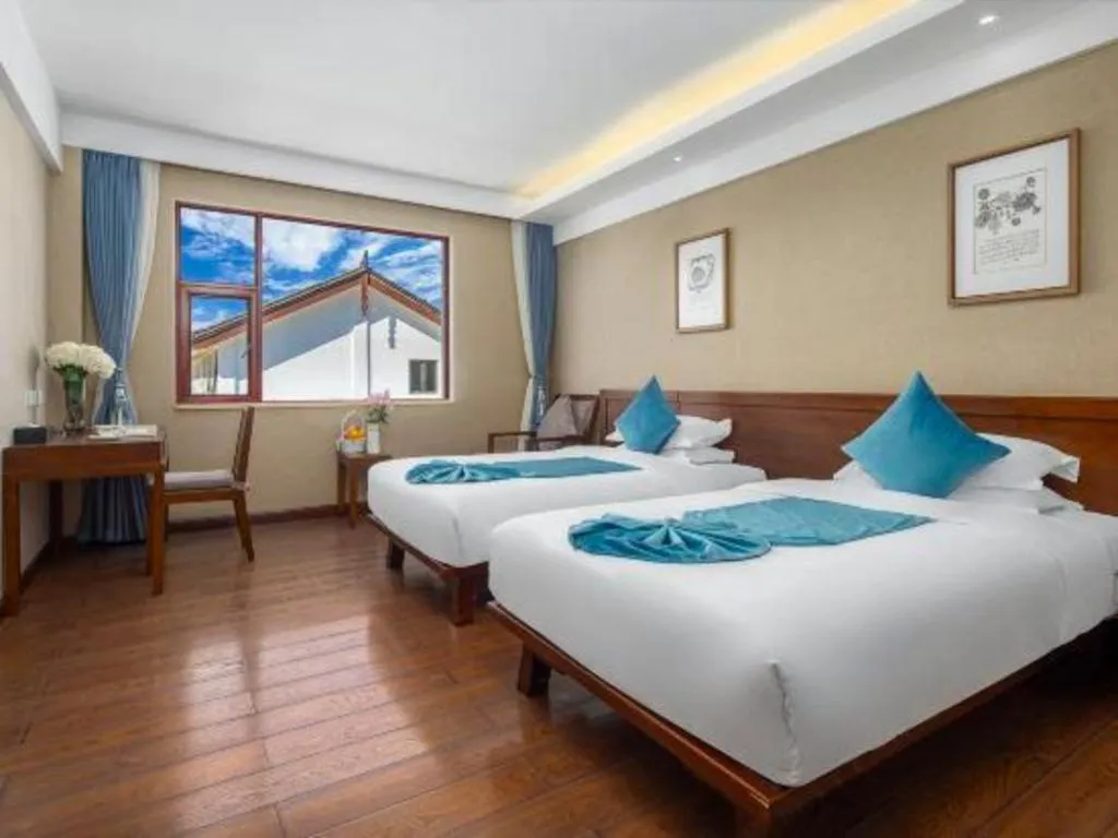 Bed in Lijiang Ziyue Hotel