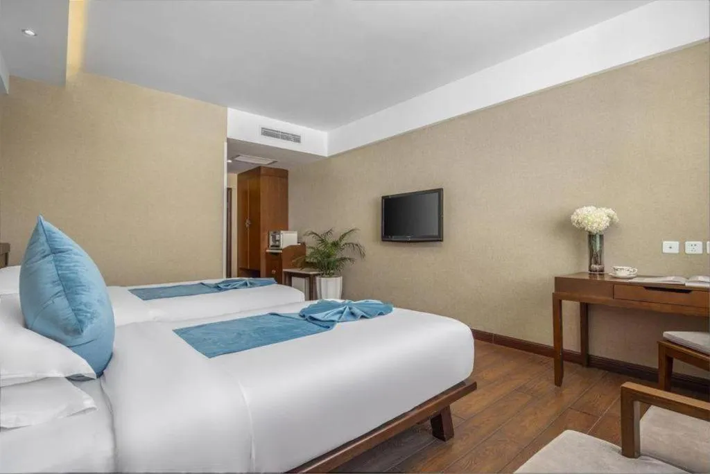 Bed in Lijiang Ziyue Hotel