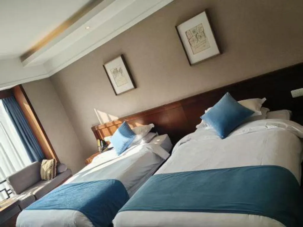 Bed in Lijiang Ziyue Hotel