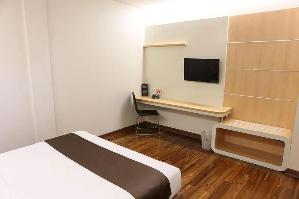 Bed in Sub City Hotel