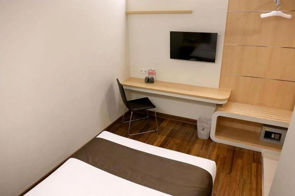 Bed in Sub City Hotel