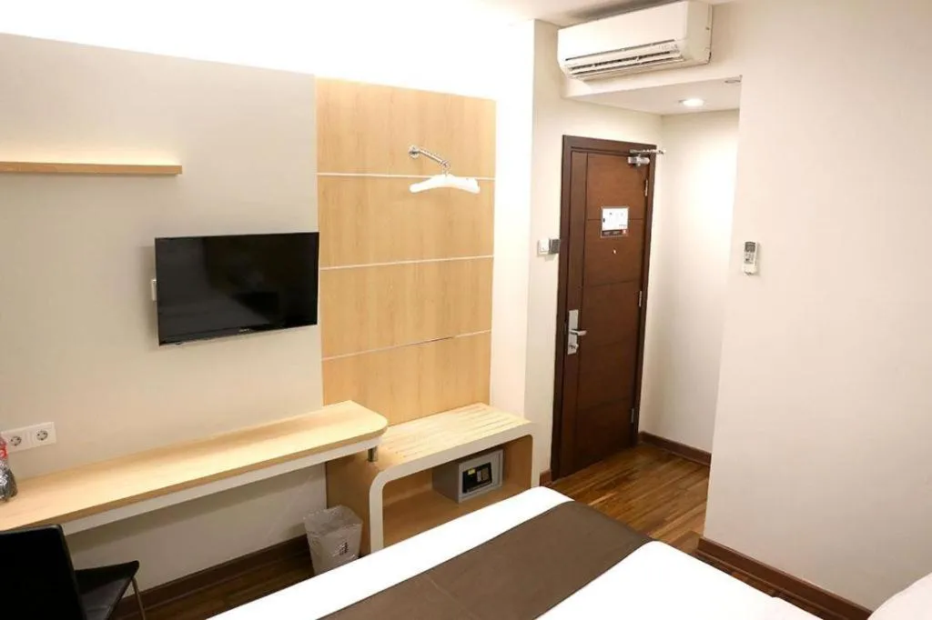 Bed in Sub City Hotel