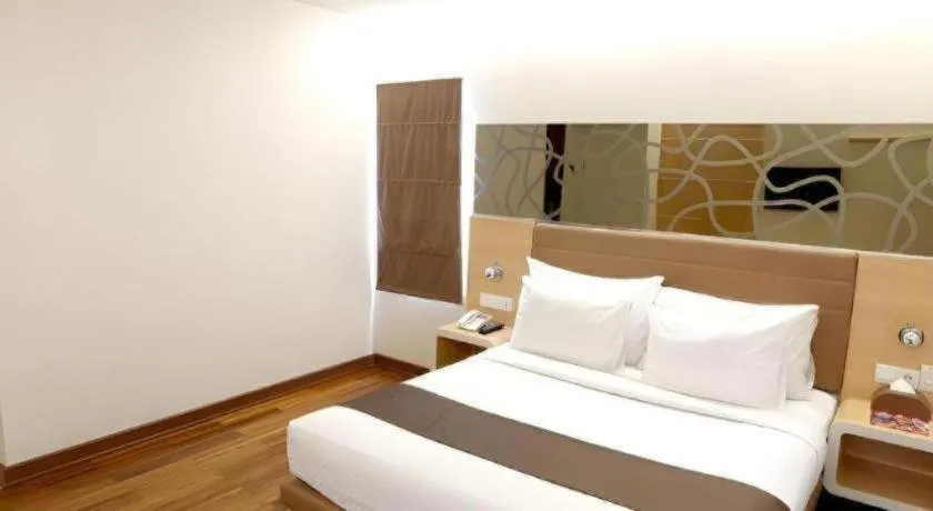 Bed in Sub City Hotel