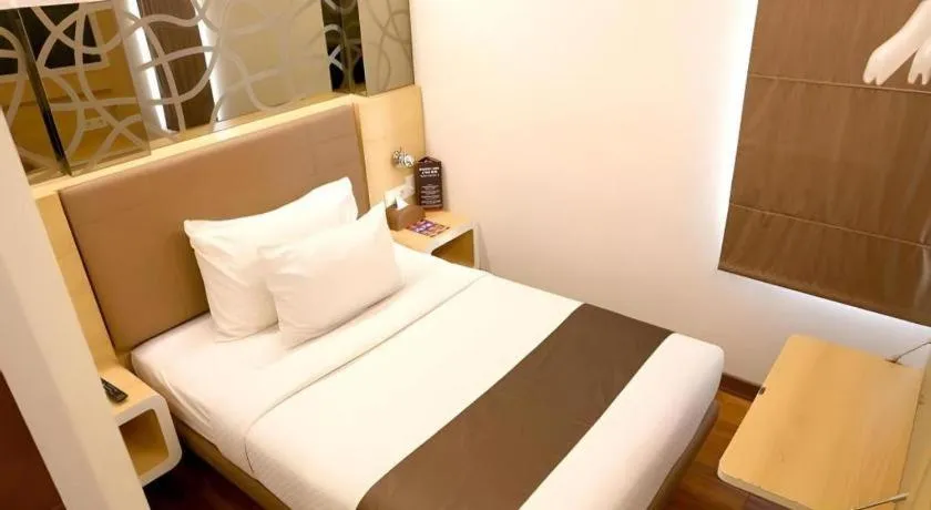 Bed in Sub City Hotel