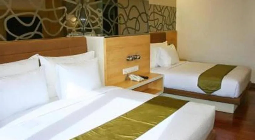 Bed in Sub City Hotel