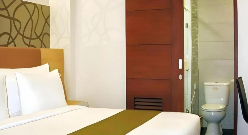 Bed in Sub City Hotel